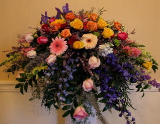 Pastel Promises Casket Spray from Lesher's Flowers, local St. Louis Florist since 1973